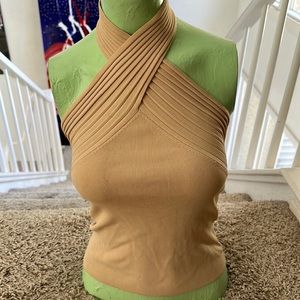 Beige sleeveless collar neck ribbed swirled top